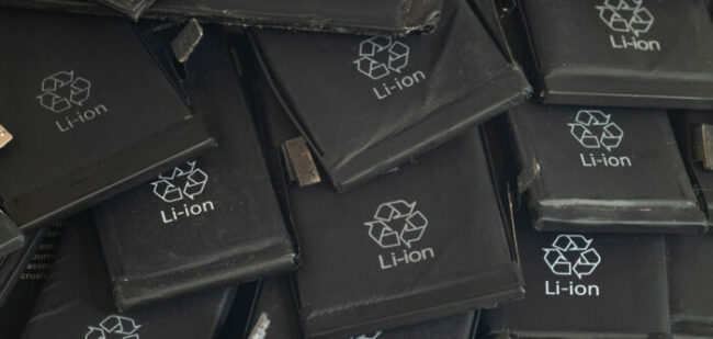 Close up of old used lithium polymer batteries of mobile phones preparation for recycling.